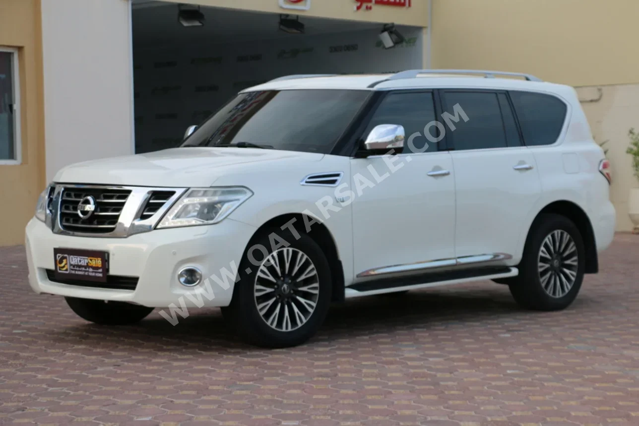 Nissan  Patrol  Platinum  2014  Automatic  153,000 Km  8 Cylinder  Four Wheel Drive (4WD)  SUV  White