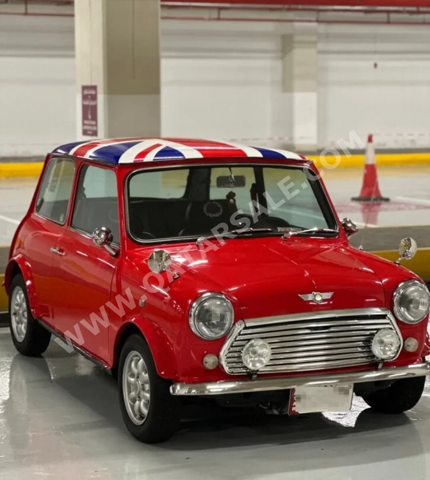 Mini  Cooper  1979  Automatic  40,000 Km  4 Cylinder  Front Wheel Drive (FWD)  Hatchback  Red  With Warranty