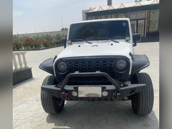 Jeep  Wrangler  Sport  2015  Automatic  280,000 Km  6 Cylinder  Four Wheel Drive (4WD)  SUV  White