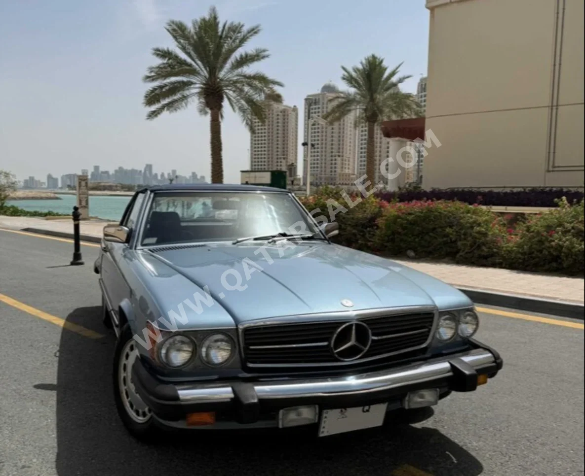 Mercedes-Benz 560 SL 1987 Automatic 148,000 Km 8 Cylinder Rear Wheel Drive (RWD) Convertible Light Sky Blue