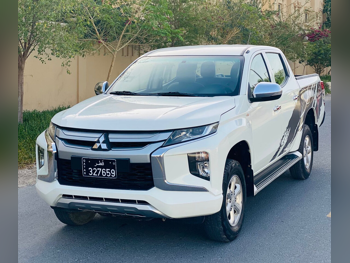 Mitsubishi  L 200  2021  Manual  180,000 Km  4 Cylinder  Four Wheel Drive (4WD)  Pick Up  White