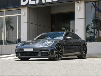 Porsche  Panamera  Premium Edition  2018  Automatic  104,000 Km  6 Cylinder  Rear Wheel Drive (RWD)  Sedan  Dark Gray