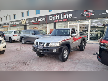 نيسان  باترول  بيك اب  2013  عادي  130,000 كم  6 سلندر  دفع رباعي  بيكب  فضي