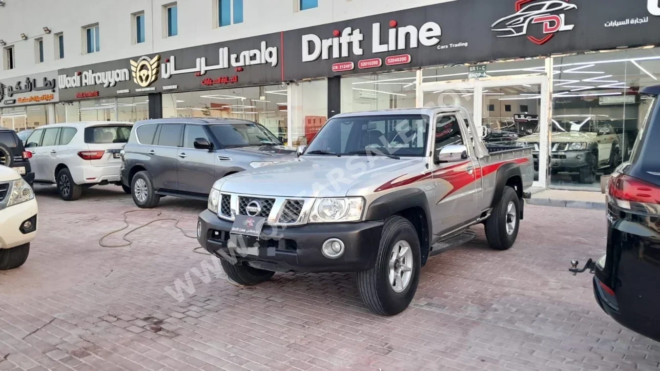 Nissan  Patrol  Pickup  2013  Manual  130,000 Km  6 Cylinder  Four Wheel Drive (4WD)  Pick Up  Silver