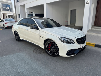 مرسيدس - بنز  اي - كلاس  63 AMG  2010  اوتوماتيك  168,000 كم  8 سلندر  دفع خلفي  سيدان  أبيض