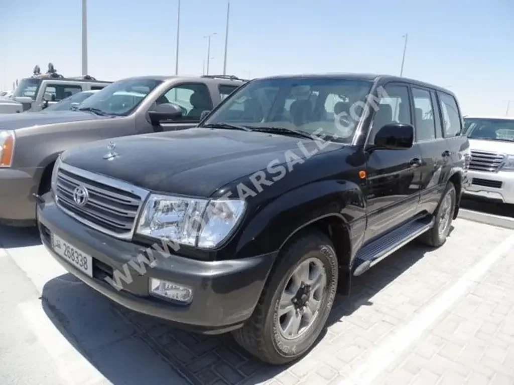 Toyota  Land Cruiser  GXR  2004  Automatic  330,000 Km  6 Cylinder  Four Wheel Drive (4WD)  SUV  Black  With Warranty