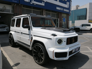 مرسيدس - بنز  جي - كلاس  63 اي ام جي  2021  اوتوماتيك  61,000 كم  8 سلندر  دفع رباعي  اس يو في  أبيض  تحت الضمان