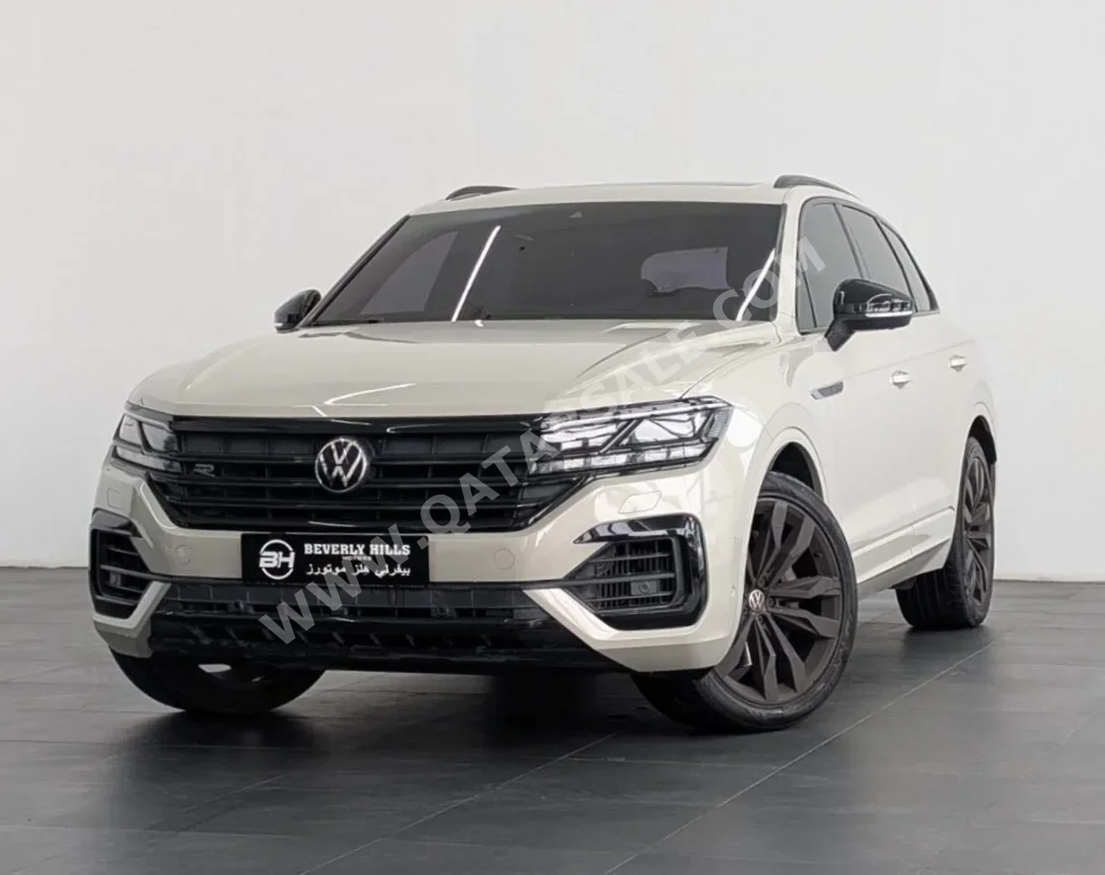 Volkswagen  Touareg  R line  2022  Automatic  62,197 Km  6 Cylinder  All Wheel Drive (AWD)  SUV  Beige  With Warranty