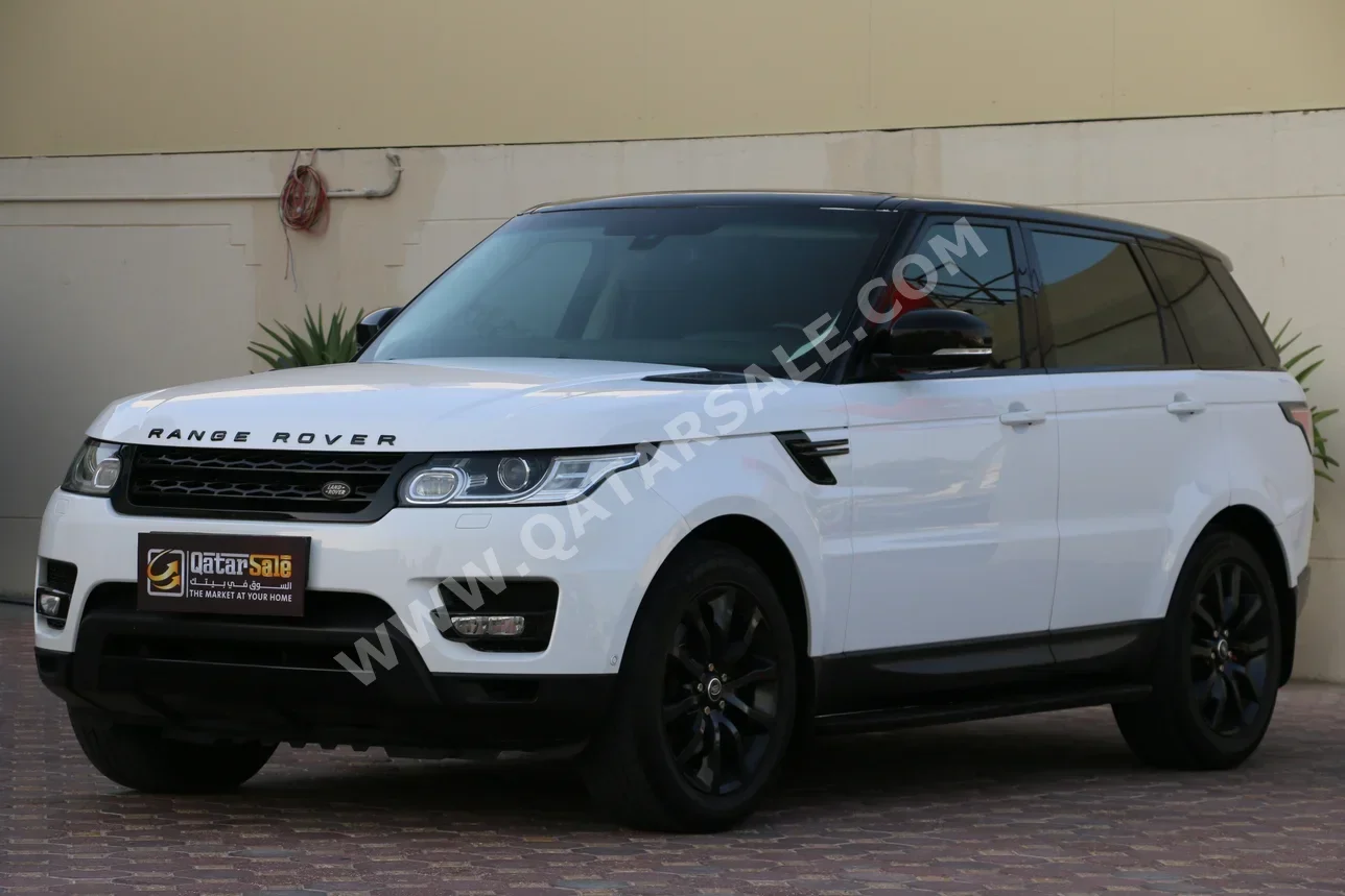 Land Rover  Range Rover  Sport  2014  Automatic  119,000 Km  6 Cylinder  Four Wheel Drive (4WD)  SUV  White