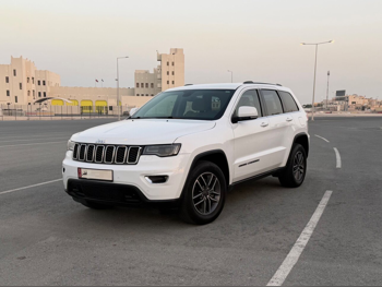 Jeep  Grand Cherokee  Laredo  2019  Automatic  99,000 Km  6 Cylinder  Four Wheel Drive (4WD)  SUV  White