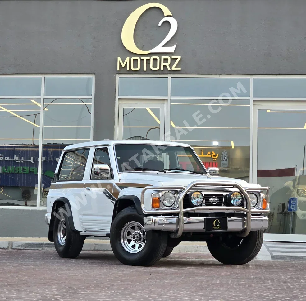 Nissan  Patrol  1993  Manual  461,000 Km  6 Cylinder  Four Wheel Drive (4WD)  SUV  White