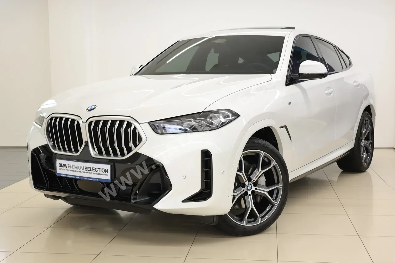 BMW  X-Series  X6 40i  2025  Automatic  9,600 Km  6 Cylinder  All Wheel Drive (AWD)  SUV  White  With Warranty