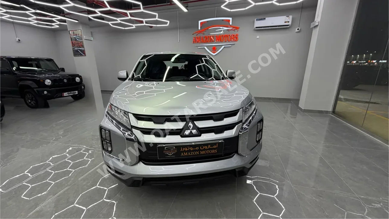 Mitsubishi  ASX  2021  Automatic  105,000 Km  4 Cylinder  Front Wheel Drive (FWD)  Hatchback  Silver