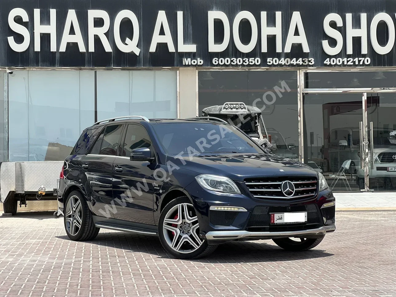 مرسيدس - بنز  ام ال  63 AMG  2014  اوتوماتيك  97,000 كم  8 سلندر  دفع كلي مستمر  اس يو في  أزرق غامق