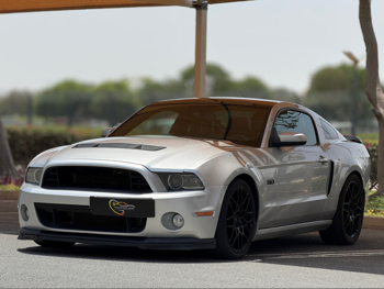 Ford  Mustang  GT  2014  Manual  171,000 Km  8 Cylinder  Rear Wheel Drive (RWD)  Coupe / Sport  Silver