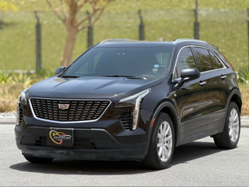 Cadillac  XT4  Premium Luxury  2023  Automatic  30,000 Km  6 Cylinder  Four Wheel Drive (4WD)  SUV  Black