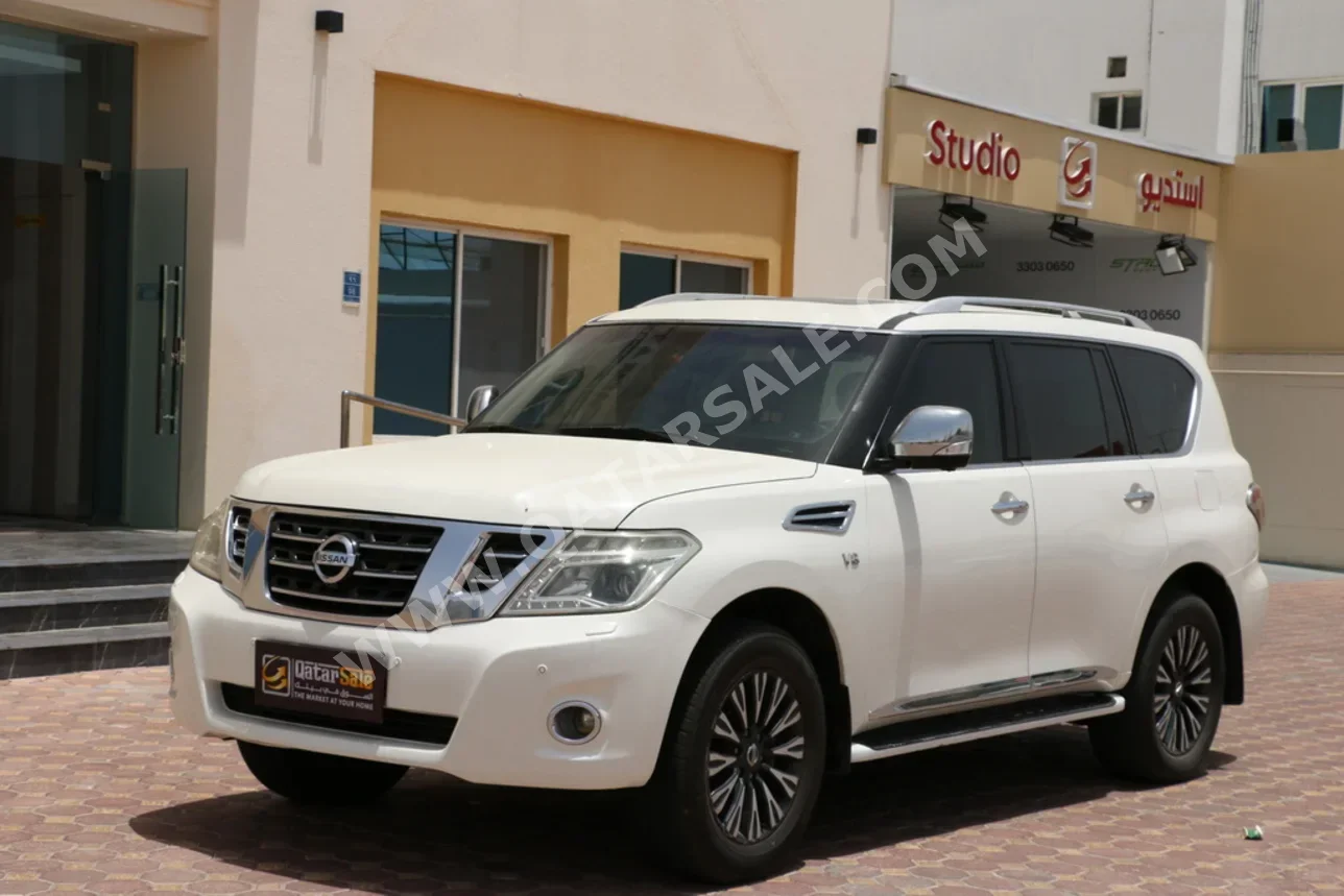 Nissan Patrol Platinum 2014 Automatic 208,000 Km 8 Cylinder Four Wheel Drive (4WD) SUV White