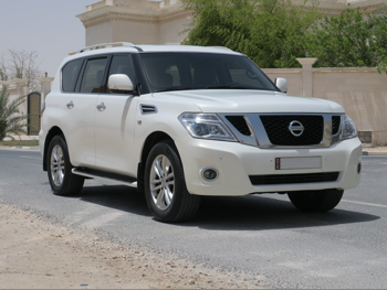 Nissan  Patrol  LE  2012  Automatic  332,000 Km  8 Cylinder  Four Wheel Drive (4WD)  SUV  White