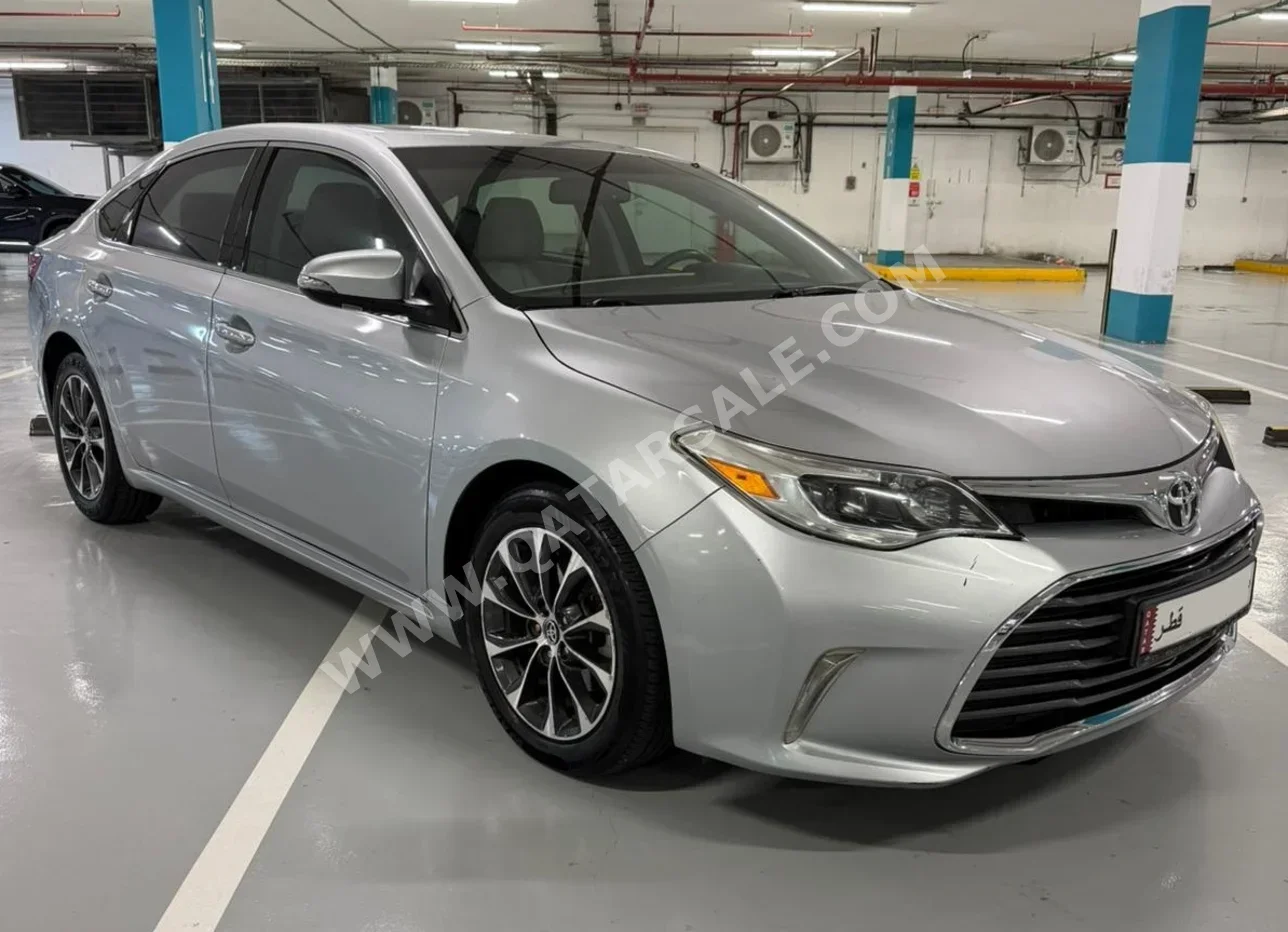 Toyota  Avalon  XLE  2016  Automatic  90,000 Km  6 Cylinder  Front Wheel Drive (FWD)  Sedan  Silver