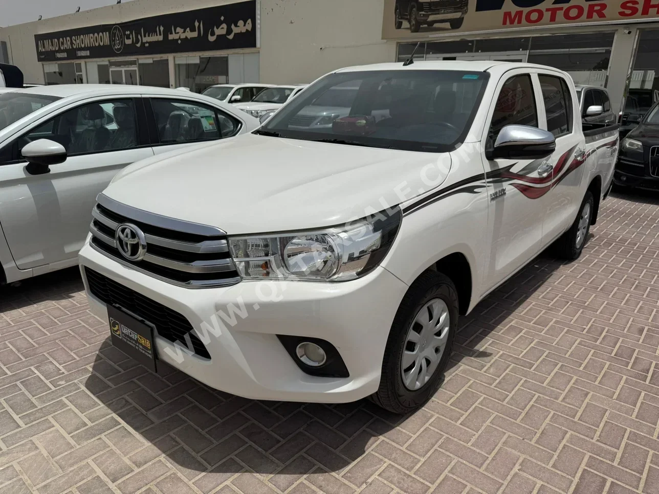 Toyota  Hilux  2020  Automatic  104,000 Km  4 Cylinder  Rear Wheel Drive (RWD)  Pick Up  White