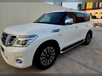 Nissan  Patrol  Platinum  2015  Automatic  288,000 Km  8 Cylinder  Four Wheel Drive (4WD)  SUV  White