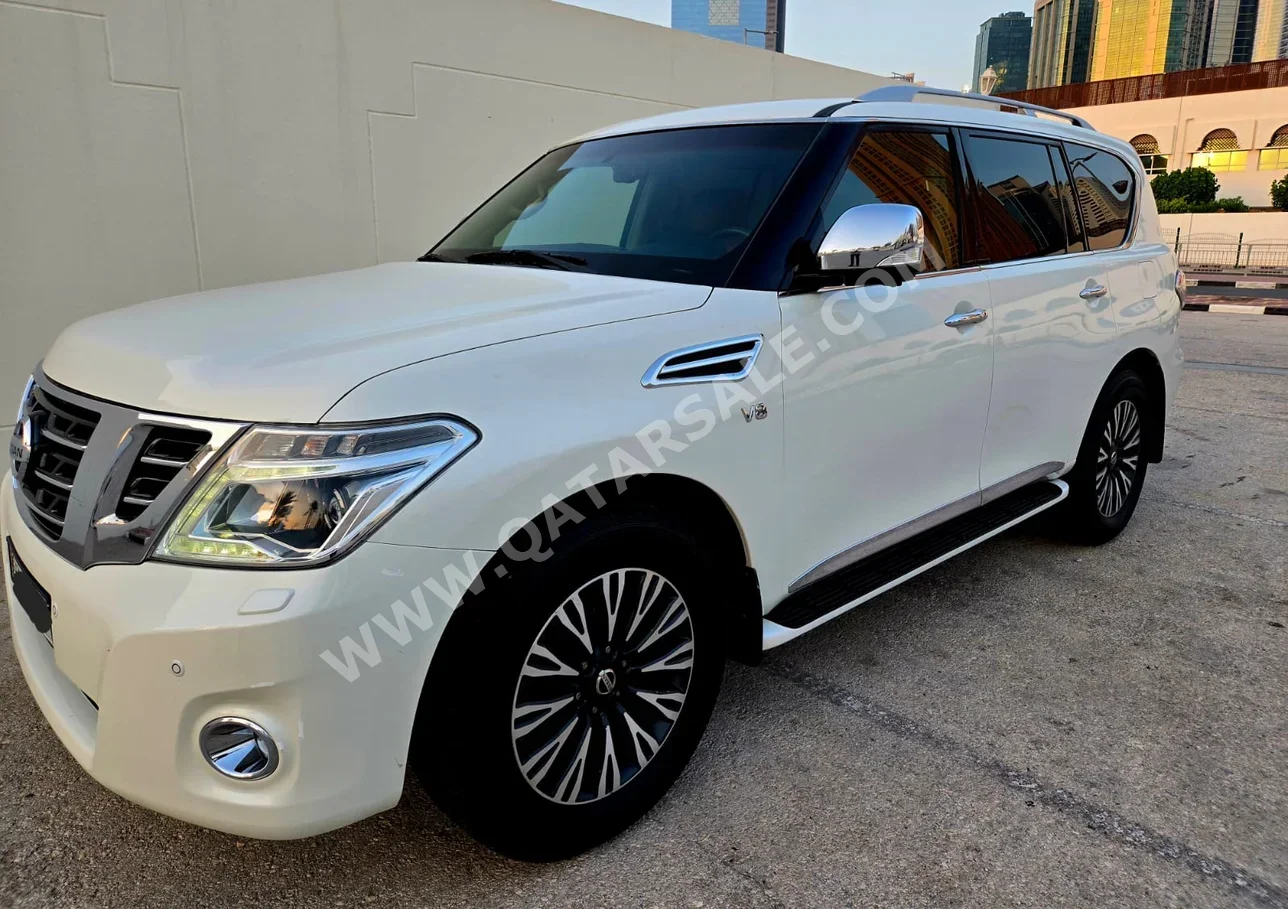 Nissan Patrol Platinum 2015 Automatic 288,000 Km 8 Cylinder Four Wheel Drive (4WD) SUV White