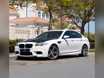 BMW  M-Series  5  2013  Automatic  145,000 Km  8 Cylinder  Rear Wheel Drive (RWD)  Sedan  White