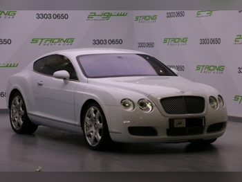 بنتلي كونتيننتل جي تي 2006 اوتوماتيك 105,000 كم 12 سلندر دفع كلي مستمر كوبيه \ سبورت أبيض