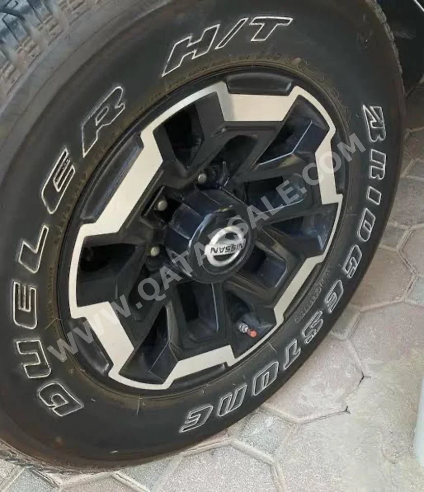 العجلات والجنوط (الرنقات) صنع في اليابان \ 4 مواسم 18"