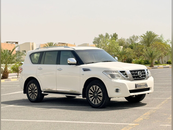 Nissan  Patrol  Platinum  2015  Automatic  259,000 Km  8 Cylinder  Four Wheel Drive (4WD)  SUV  White