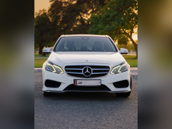 Mercedes-Benz  E-Class  300  2014  Automatic  61,500 Km  6 Cylinder  Rear Wheel Drive (RWD)  Sedan  White