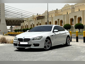 بي ام دبليو  الفئة - السادسة  650i  2015  اوتوماتيك  115,000 كم  8 سلندر  دفع خلفي  سيدان  أبيض