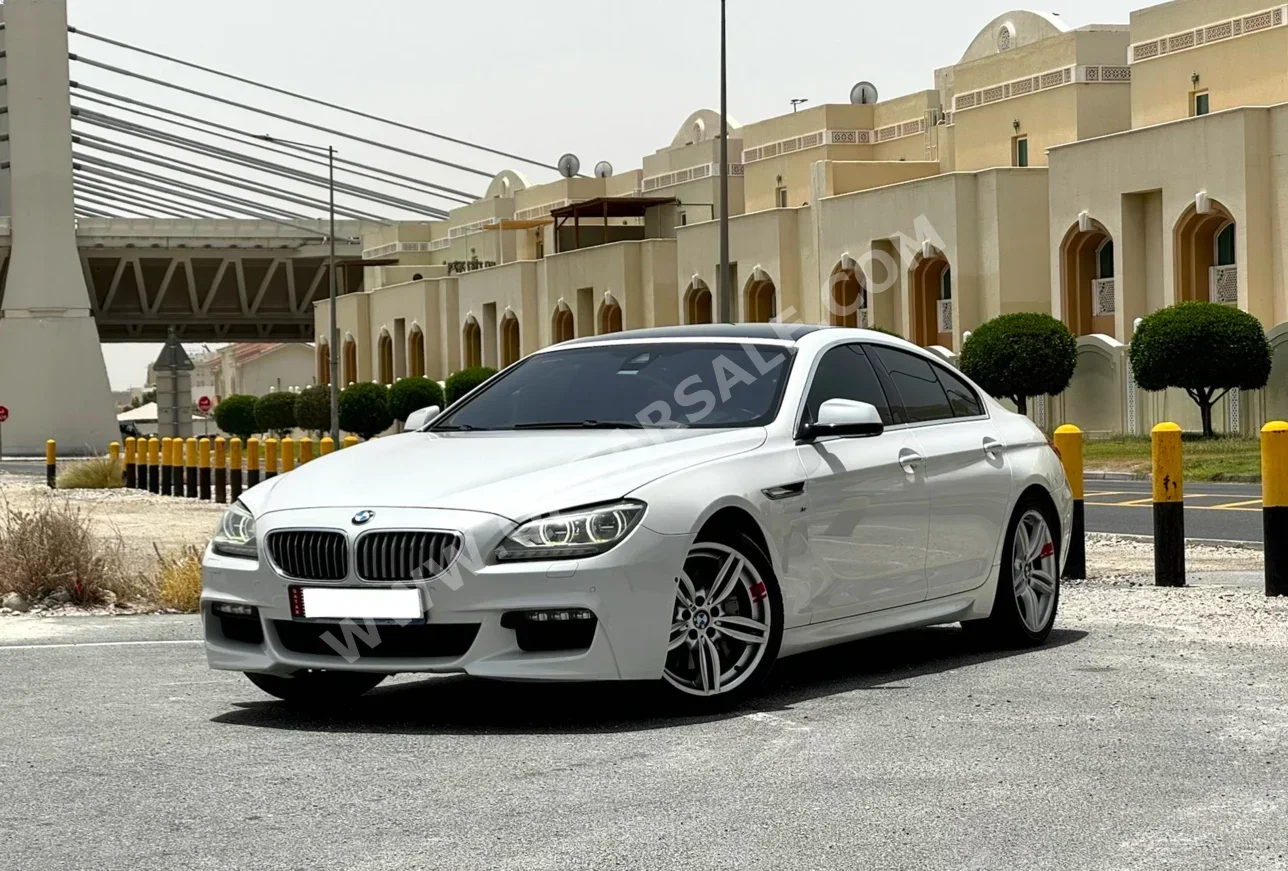 بي ام دبليو  الفئة - السادسة  650i  2015  اوتوماتيك  115,000 كم  8 سلندر  دفع خلفي  سيدان  أبيض