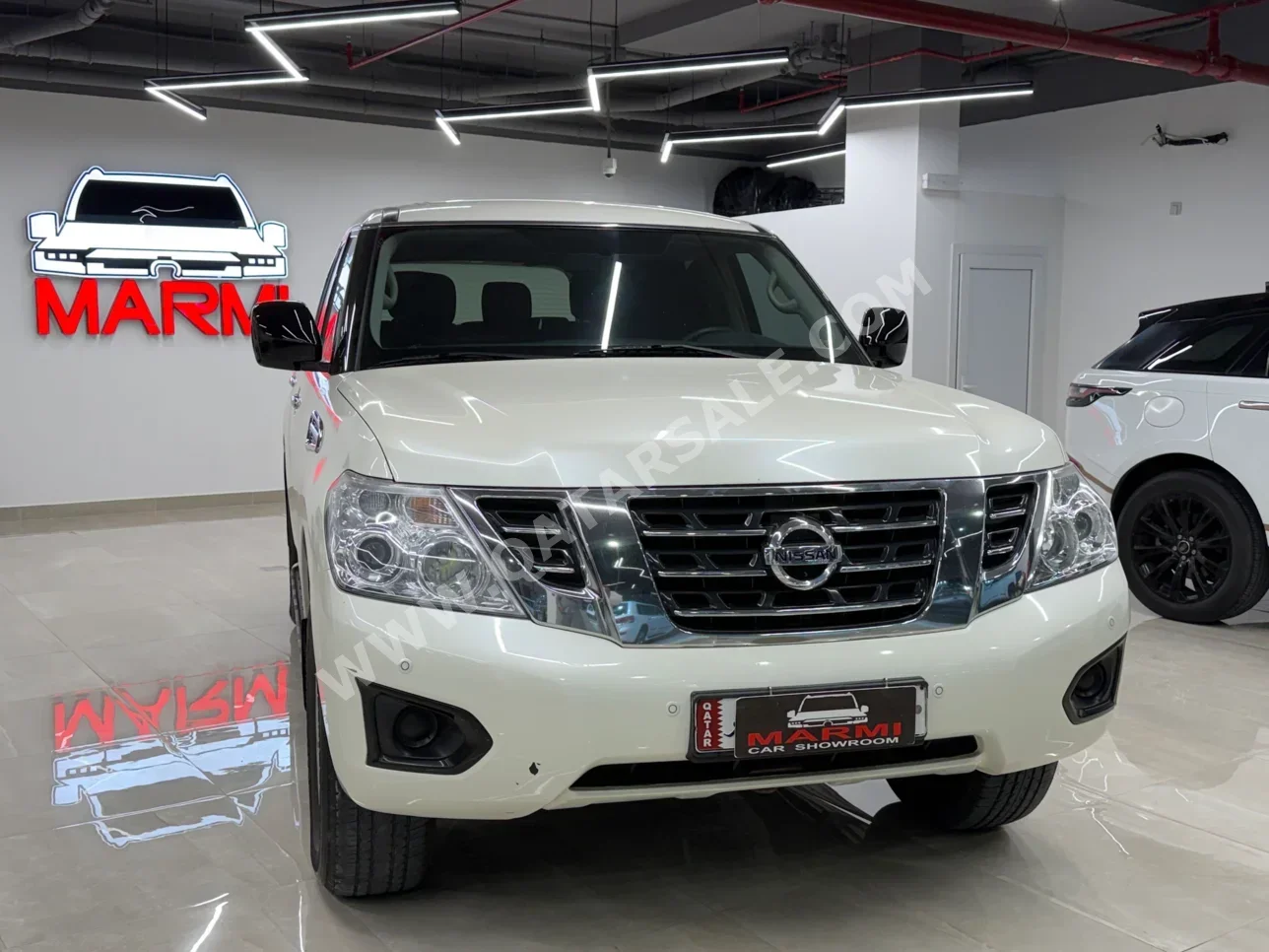 Nissan  Patrol  XE  2018  Automatic  219,000 Km  6 Cylinder  Four Wheel Drive (4WD)  SUV  White