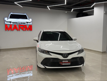 Toyota  Camry  LE  2019  Automatic  130,000 Km  4 Cylinder  Front Wheel Drive (FWD)  Sedan  White