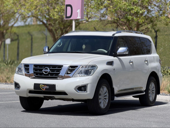 Nissan  Patrol  SE  2014  Automatic  324,000 Km  8 Cylinder  Four Wheel Drive (4WD)  SUV  White