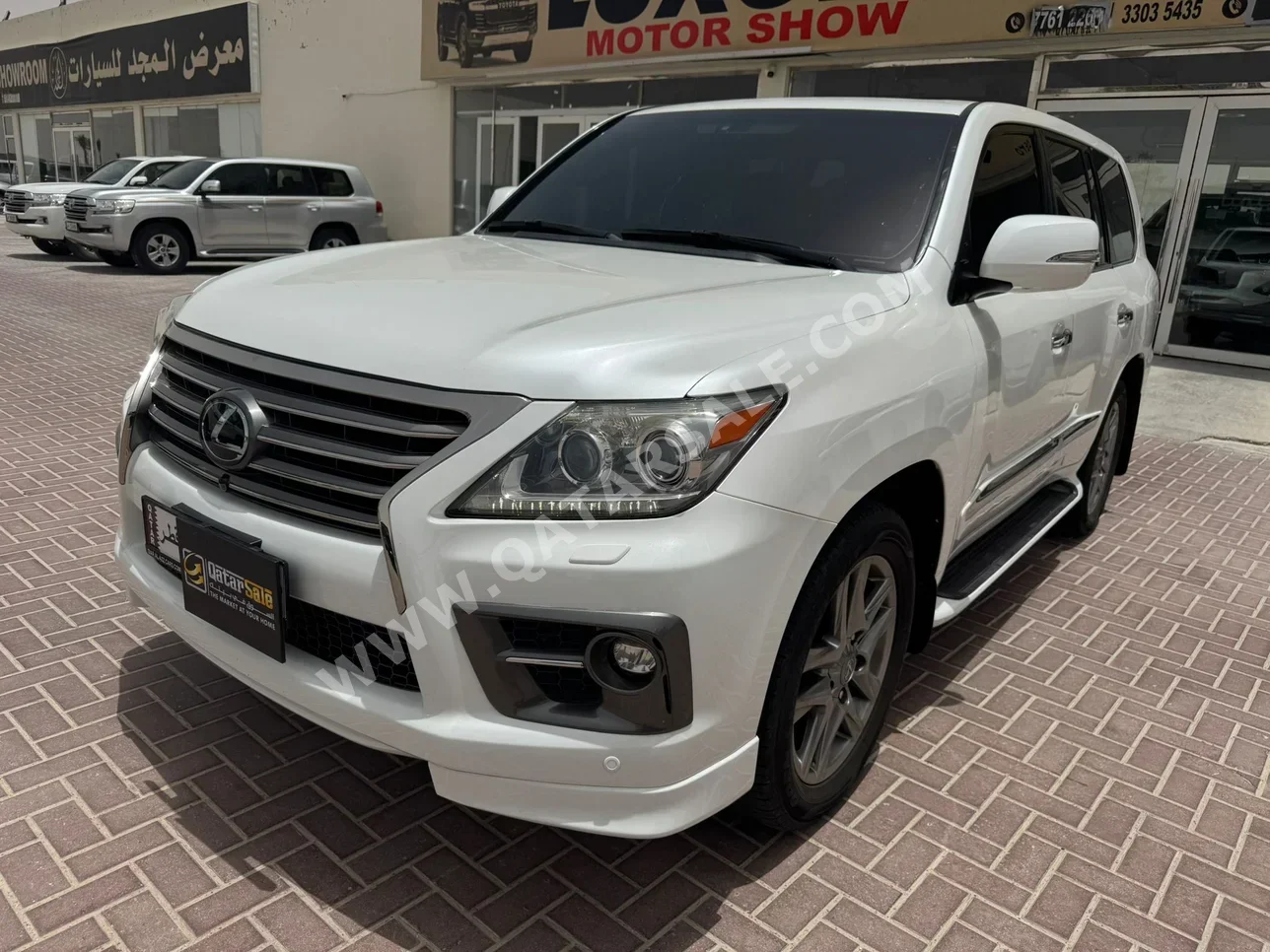 لكزس ال اكس 570 2014 اوتوماتيك 190,000 كم 8 سلندر دفع رباعي اس يو في أبيض