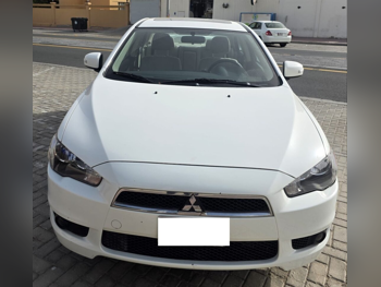 Mitsubishi  Lancer  GLS  2016  Automatic  81,253 Km  2 Cylinder  Front Wheel Drive (FWD)  Sedan  White