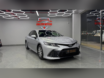 Toyota  Camry  LE  2021  Automatic  104,000 Km  4 Cylinder  Front Wheel Drive (FWD)  Sedan  Silver