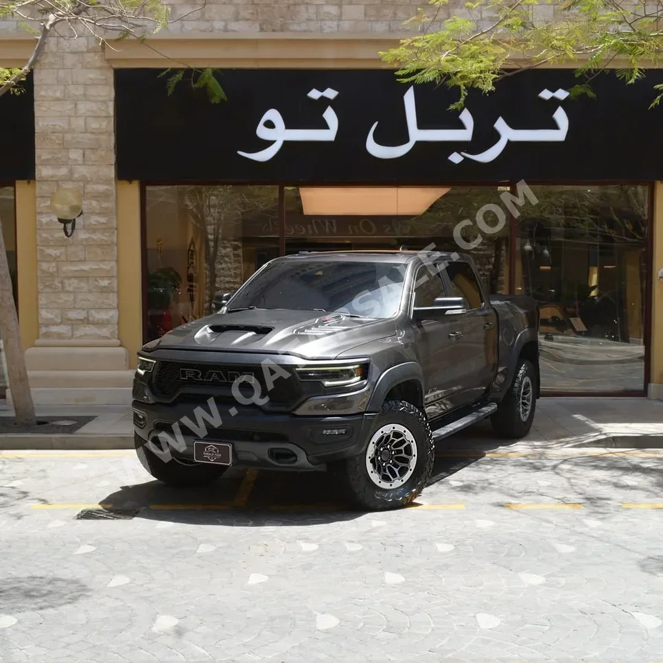 دودج  رام  تي أر إكس  2022  اوتوماتيك  99,300 كم  8 سلندر  دفع رباعي  بيكب  رمادي