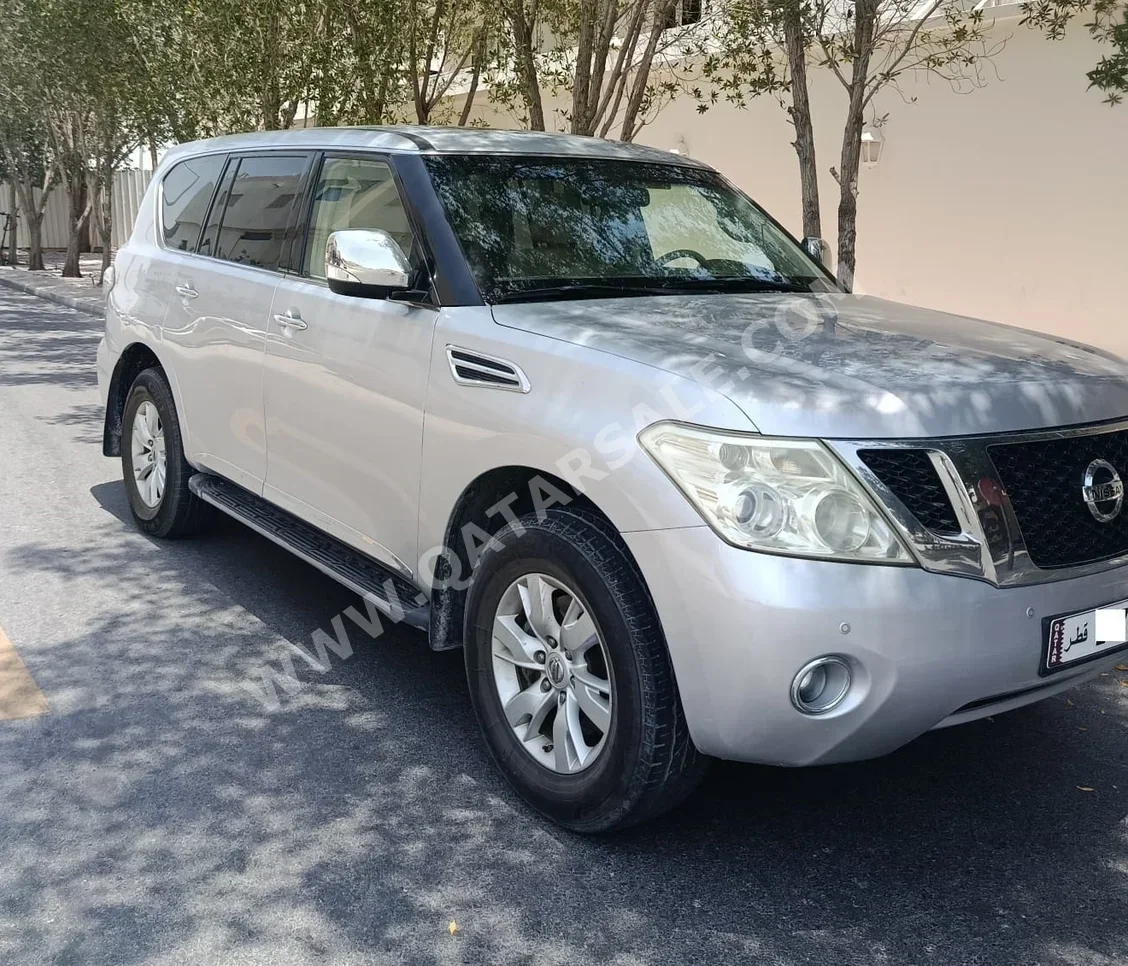 Nissan  Patrol  SE  2012  Automatic  260,000 Km  8 Cylinder  Four Wheel Drive (4WD)  SUV  Silver