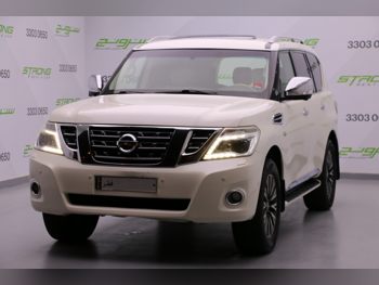 Nissan  Patrol  Platinum  2014  Automatic  327,000 Km  8 Cylinder  Four Wheel Drive (4WD)  SUV  White