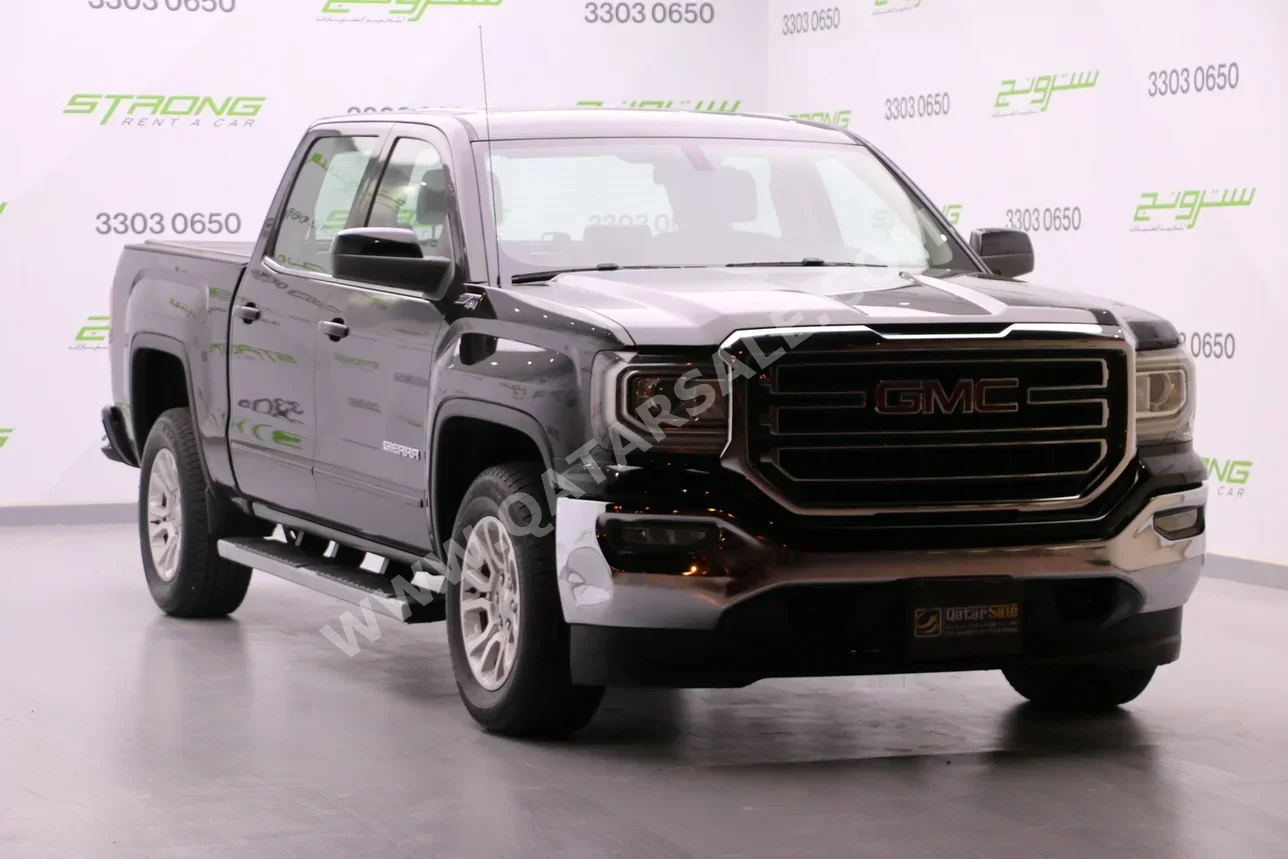 GMC  Sierra  SLE  2017  Automatic  116,000 Km  8 Cylinder  Four Wheel Drive (4WD)  Pick Up  Black