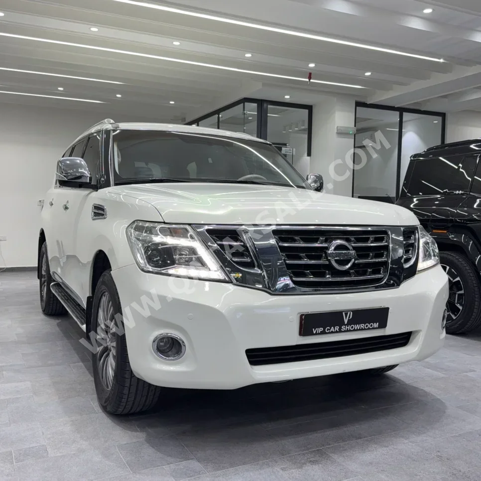 نيسان باترول ال اي 2010 اوتوماتيك 408,000 كم 8 سلندر دفع رباعي اس يو في أبيض