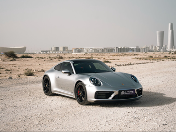 بورش  911  كاريرا جي تي اس  2023  اوتوماتيك  13,000 كم  6 سلندر  دفع خلفي  كوبيه \ سبورت  رمادي  تحت الضمان