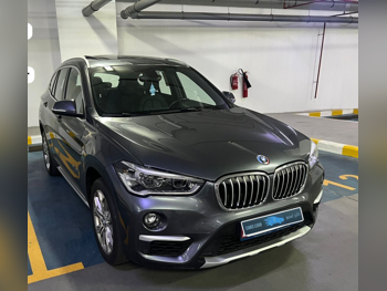 BMW  X-Series  X1  2018  Automatic  92,000 Km  4 Cylinder  Four Wheel Drive (4WD)  SUV  Gray