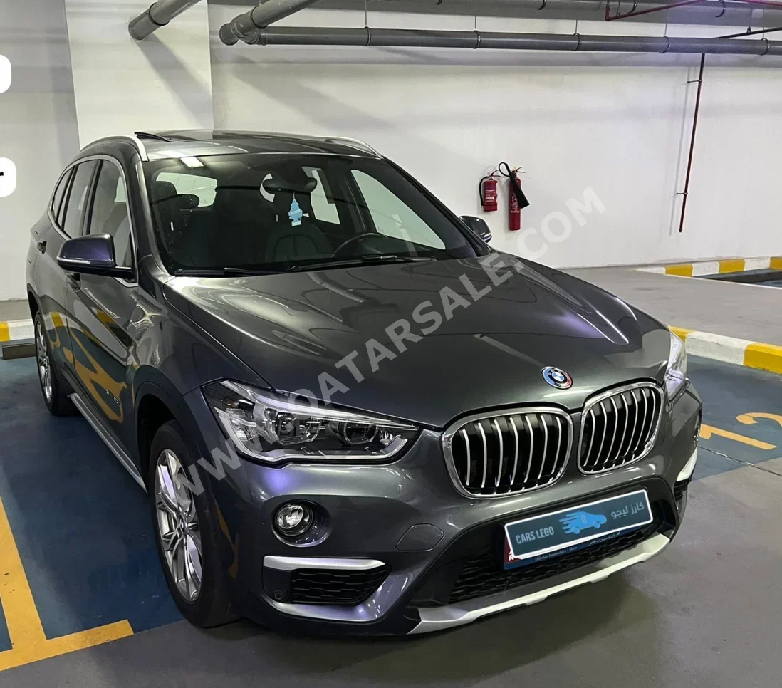 BMW  X-Series  X1  2018  Automatic  92,000 Km  4 Cylinder  Four Wheel Drive (4WD)  SUV  Gray