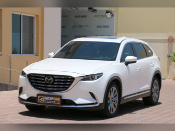 Mazda  CX  9  2023  Automatic  83,000 Km  4 Cylinder  Four Wheel Drive (4WD)  SUV  White  With Warranty
