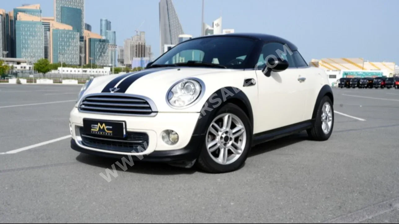 Mini Cooper Coupe 2012 Automatic 58,000 Km 4 Cylinder Front Wheel Drive (FWD) Convertible Off White