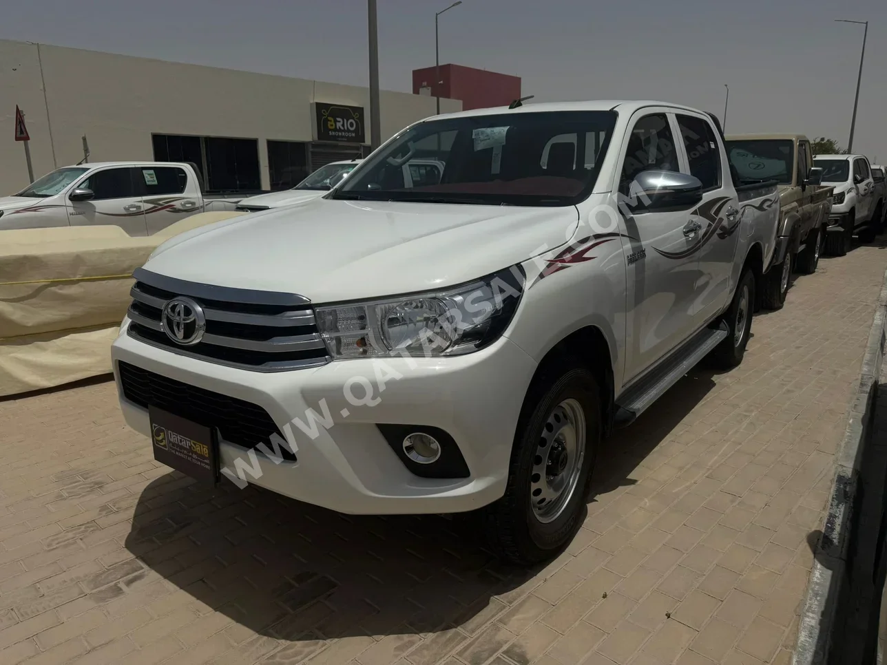 Toyota  Hilux  2026  Automatic  17,000 Km  4 Cylinder  Four Wheel Drive (4WD)  Pick Up  White  With Warranty